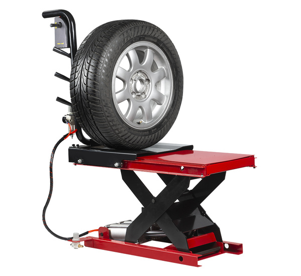 
Air-operated wheel lift for wheel balancers 