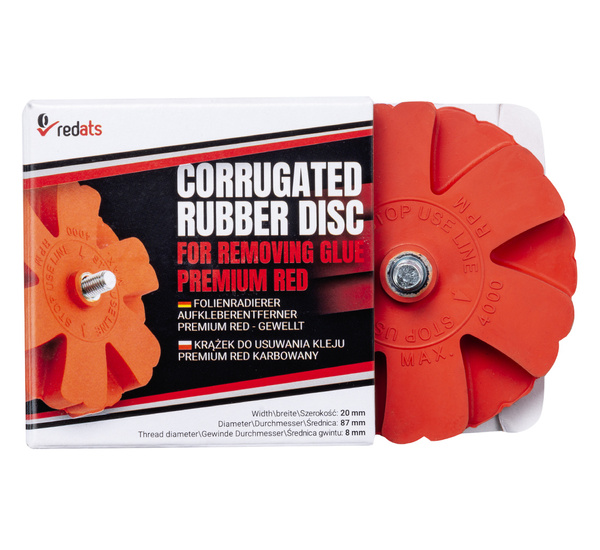 Corrugated rubber disc for removing glue for drill